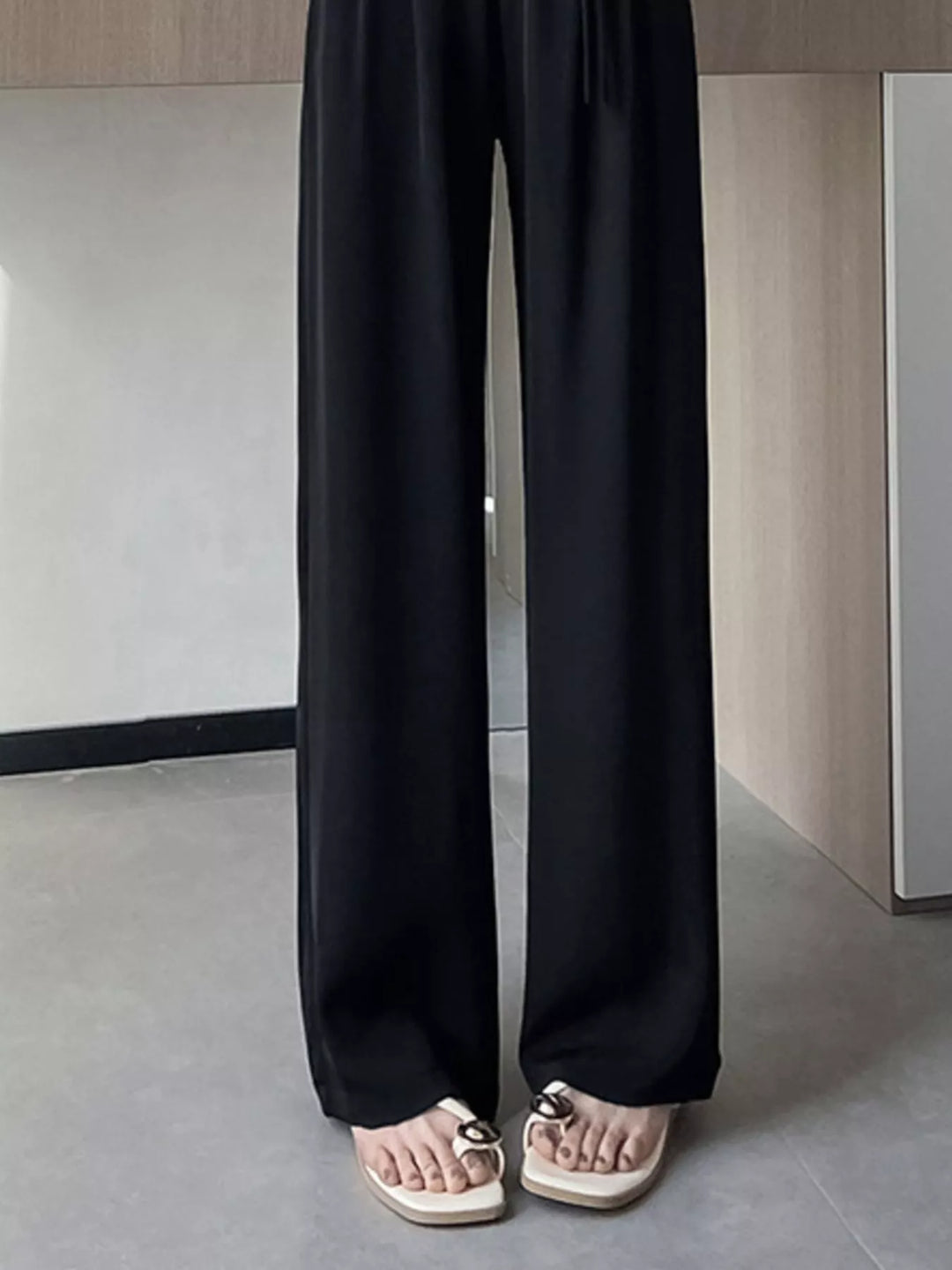 High-rise wide-leg pants with pleated front and tie waist