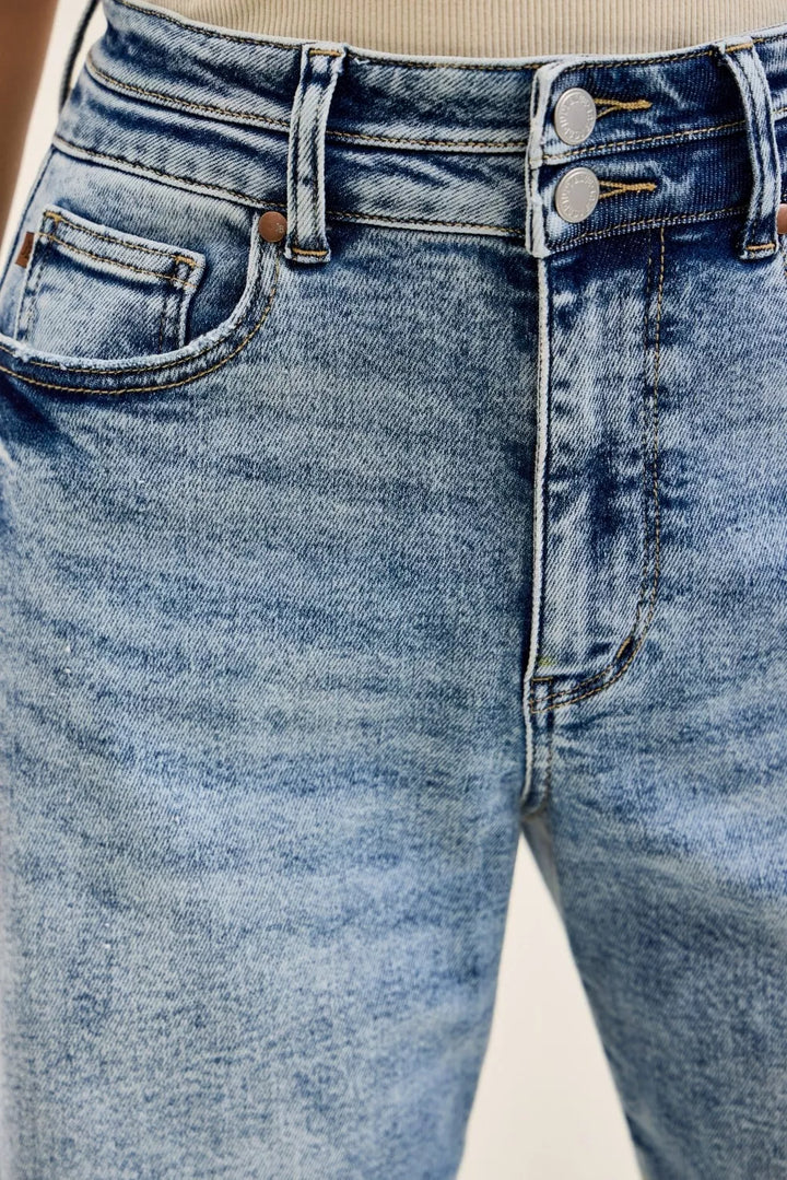 High-rise arc leg jeans with double waistband