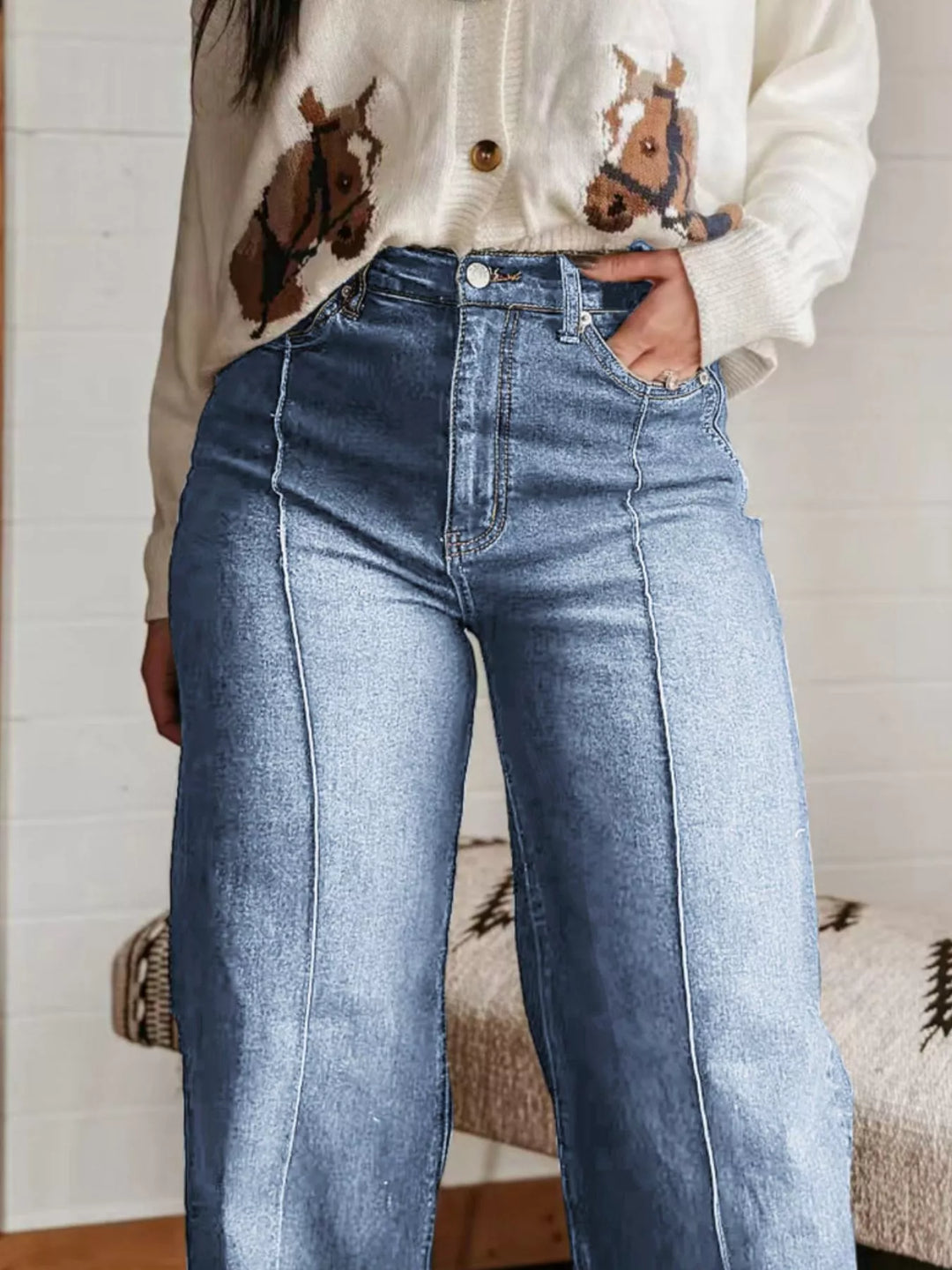 High-rise wide leg jeans with center seam and raw hem