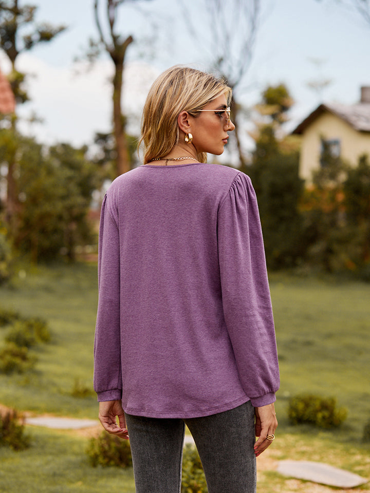Ruffle trim puff sleeve split-neck blouse