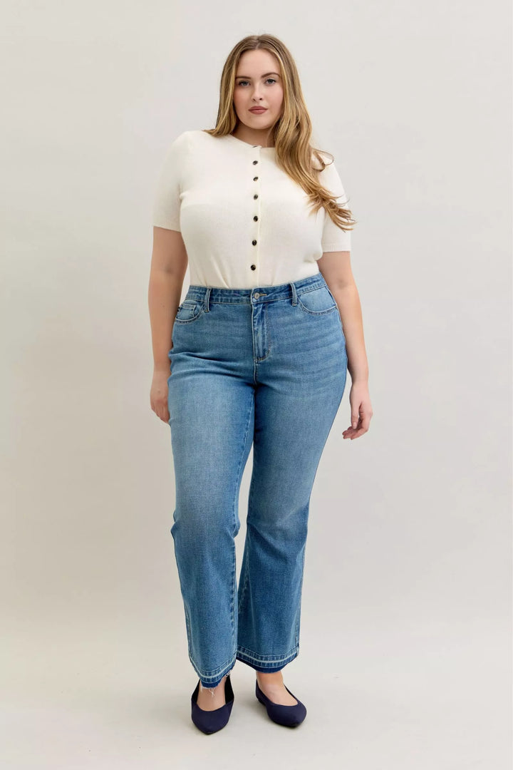 Mid-rise slim bootcut jeans with release hem and tummy control
