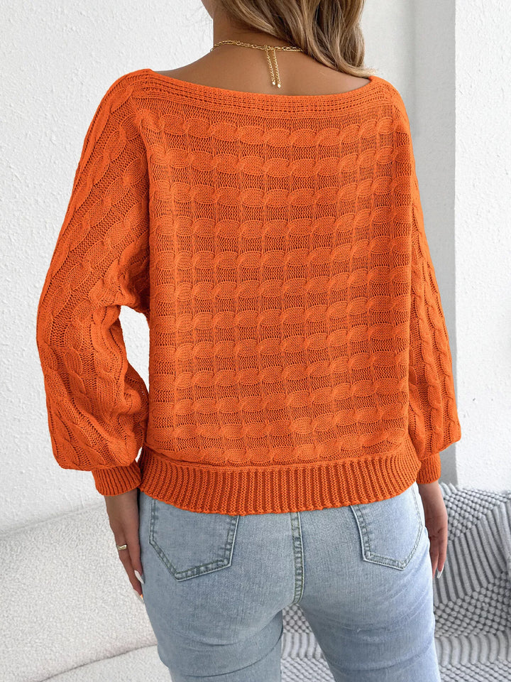 Cable knit boat neck sweater with dolman sleeves