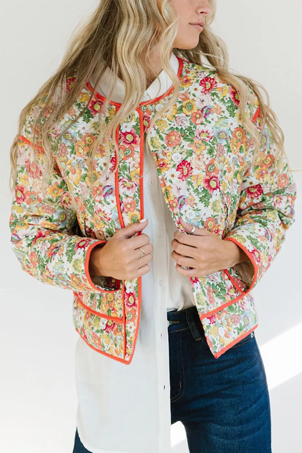 Orange-Red Quilted floral jacket with contrast piped trim and round neck