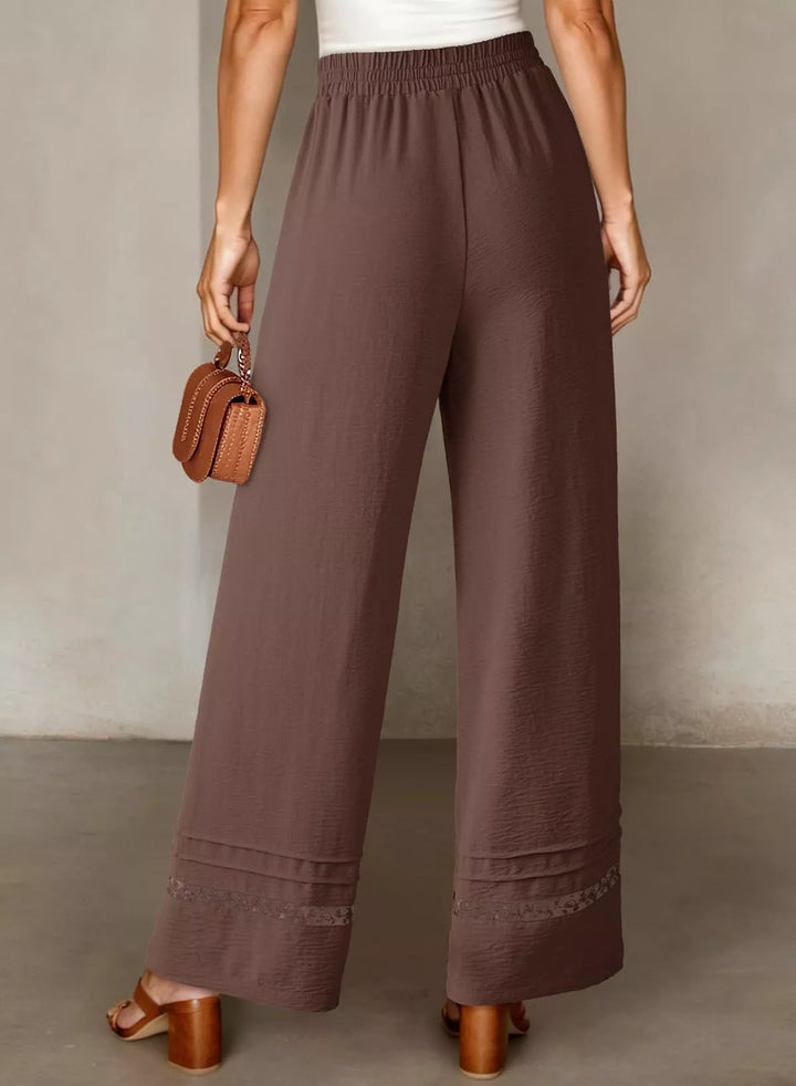 Wide leg drawstring pants with embroidered lace hem