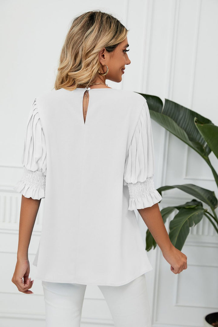 Pleated puff sleeve keyhole blouse with smocked cuffs