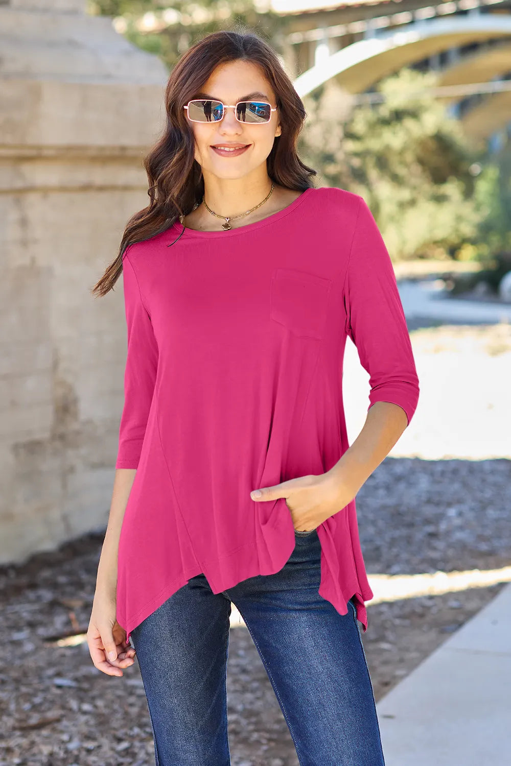 Pocketed 3/4 sleeve top with asymmetrical hem
