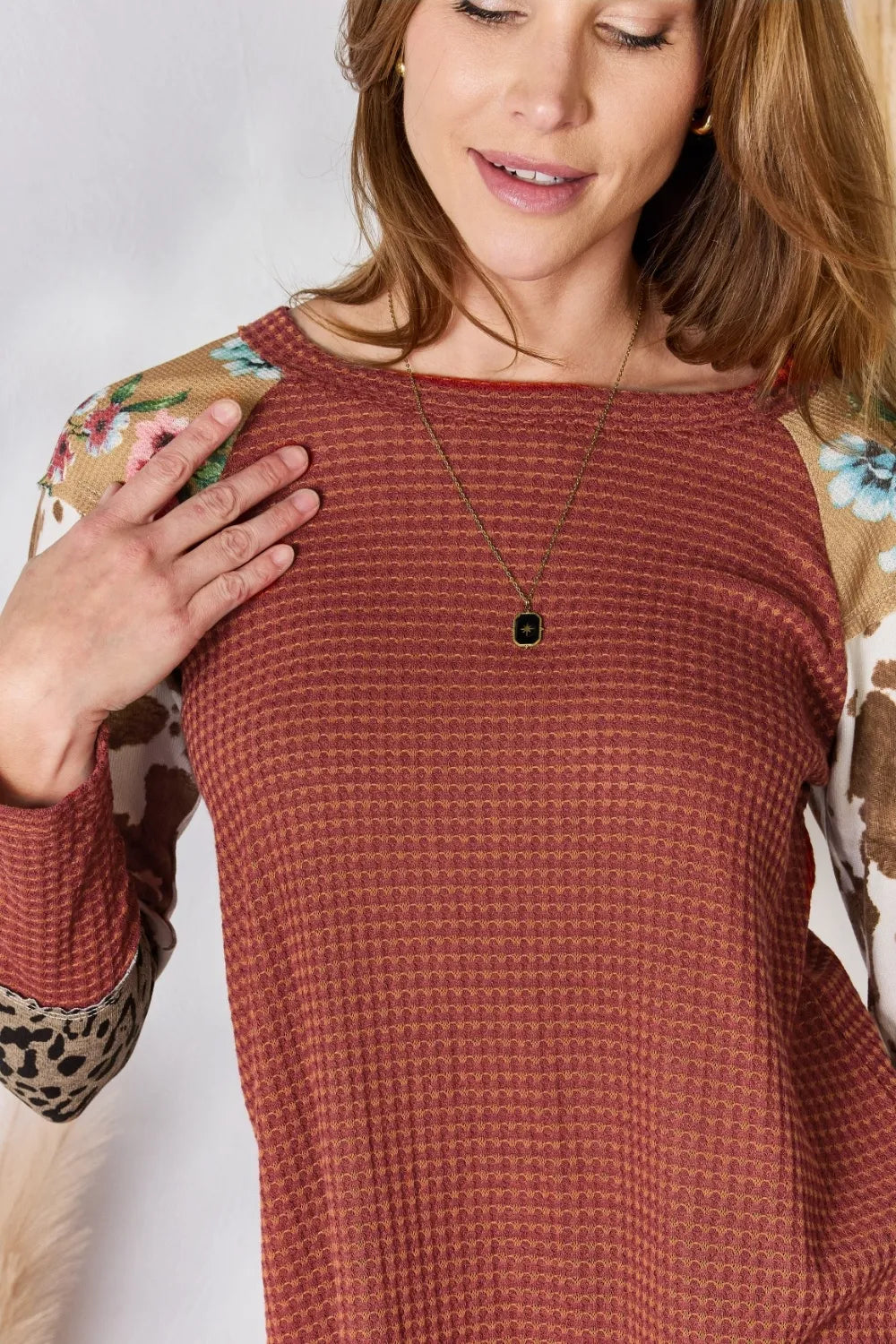 Waffle-knit top with leopard and floral print sleeves