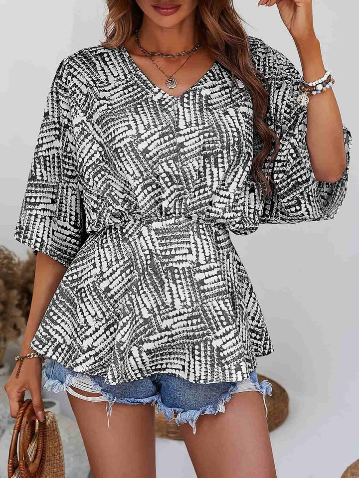 Abstract print V-neck dolman sleeve blouse
