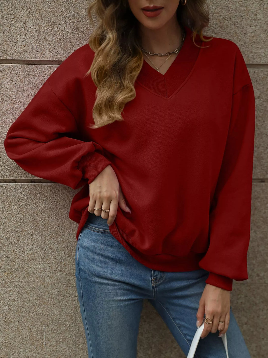 Burgundy V-neck drop-shoulder pullover sweatshirt with ribbed trim