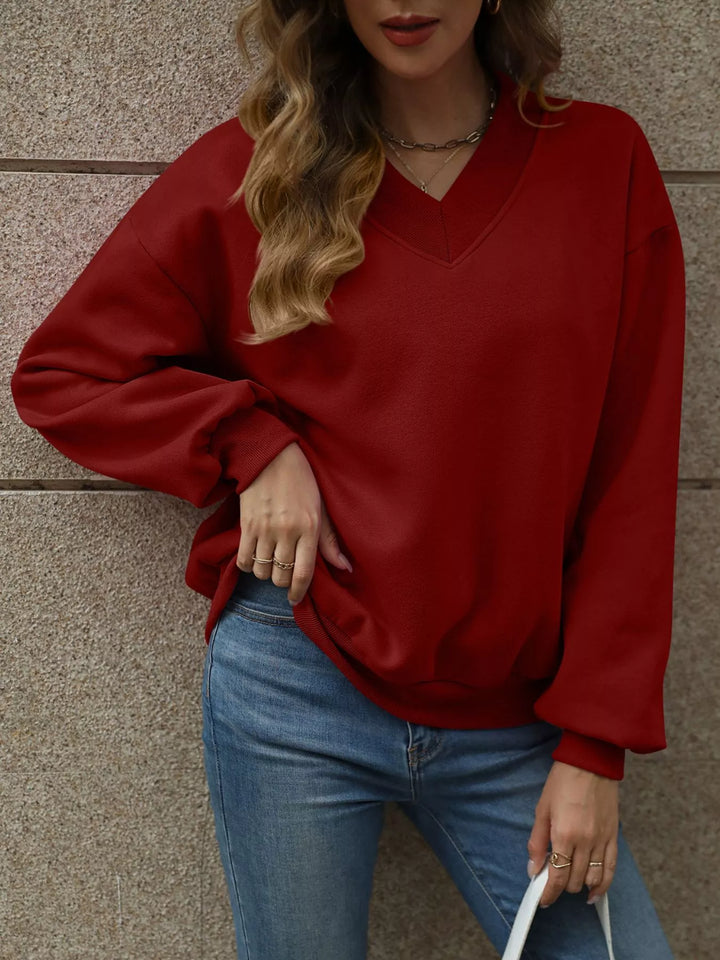 Burgundy V-neck drop-shoulder pullover sweatshirt with ribbed trim