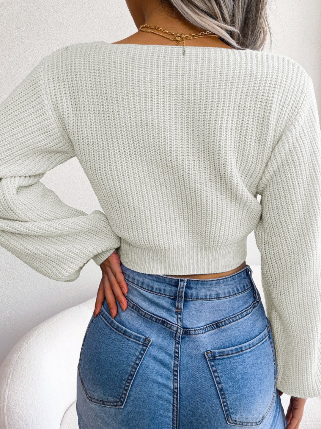Tie-front ribbed knit cropped sweater with deep V-neck