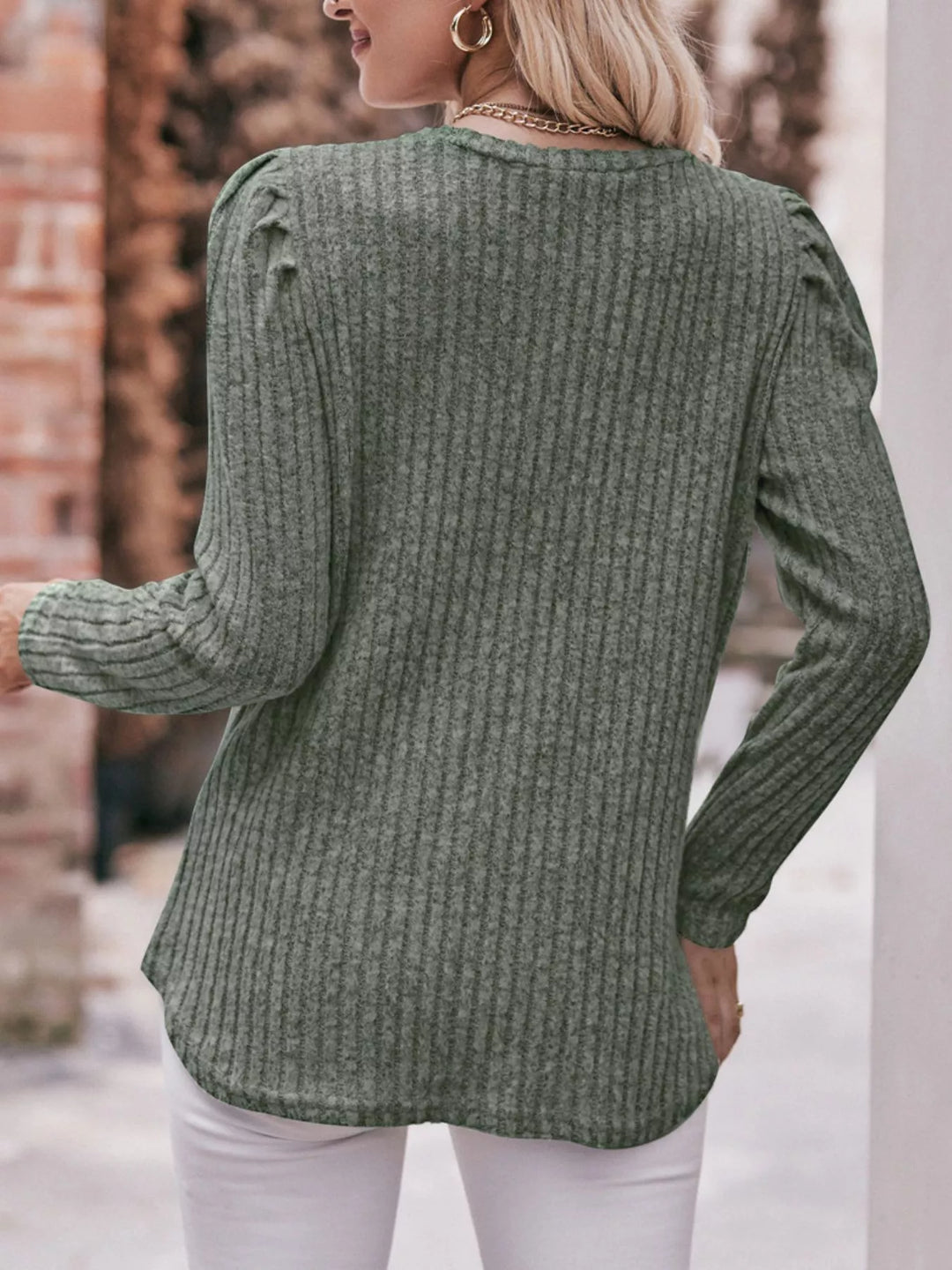 Ribbed knit long sleeve top with puff shoulders