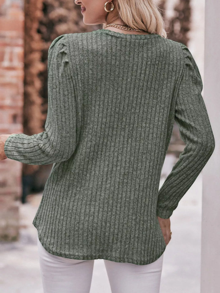 Ribbed knit long sleeve top with puff shoulders