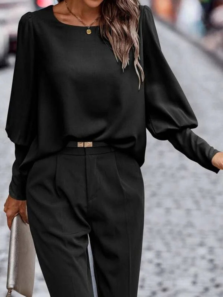 Lantern sleeve round neck blouse with puff shoulders