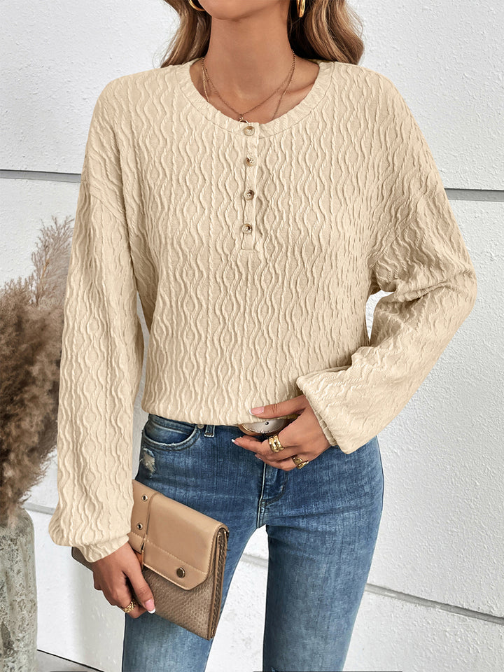 Textured half-button henley top with long sleeves