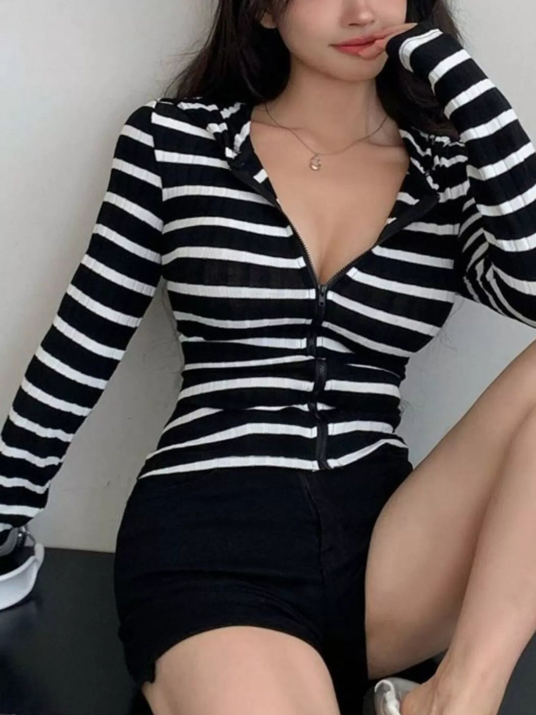 Striped ribbed zip-up top with foldover collar