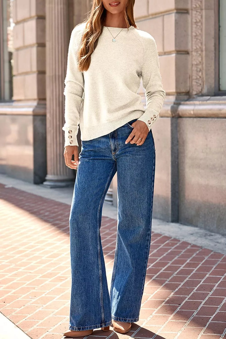 Button-cuff raglan sleeve crew neck sweater