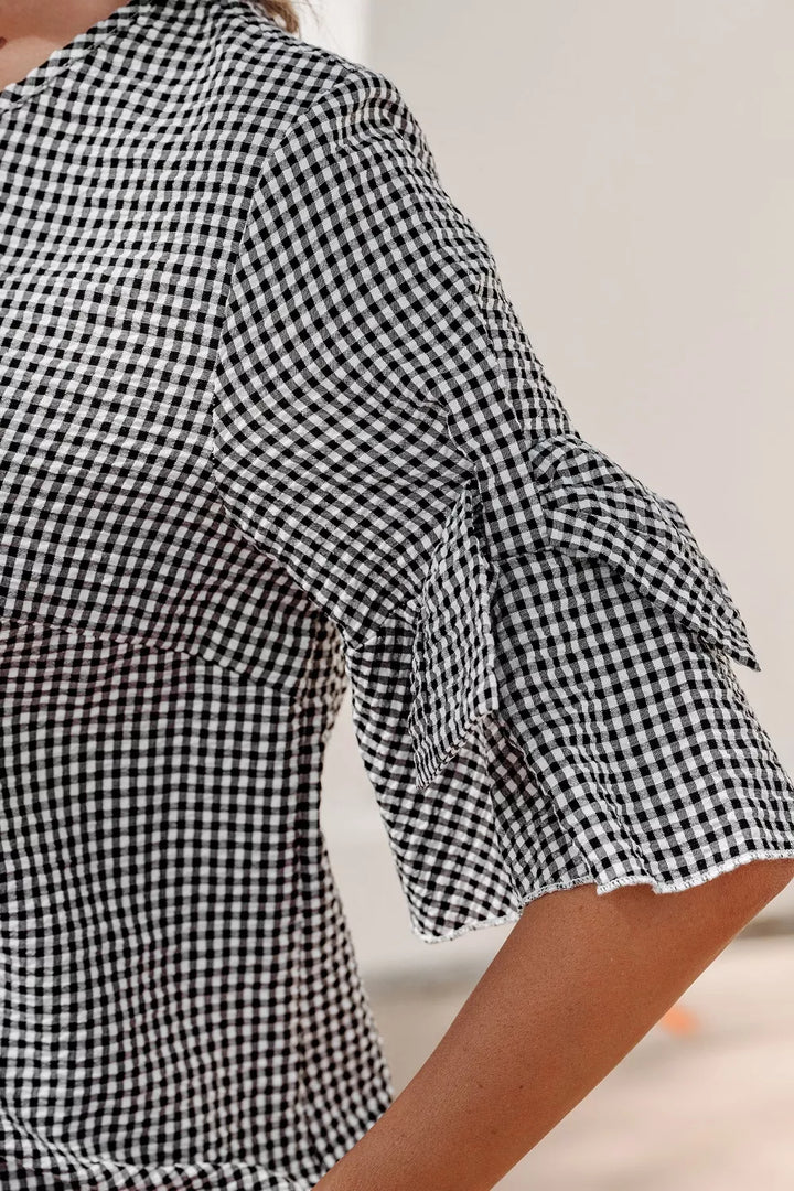 Gingham ruffle half-sleeve crew neck blouse