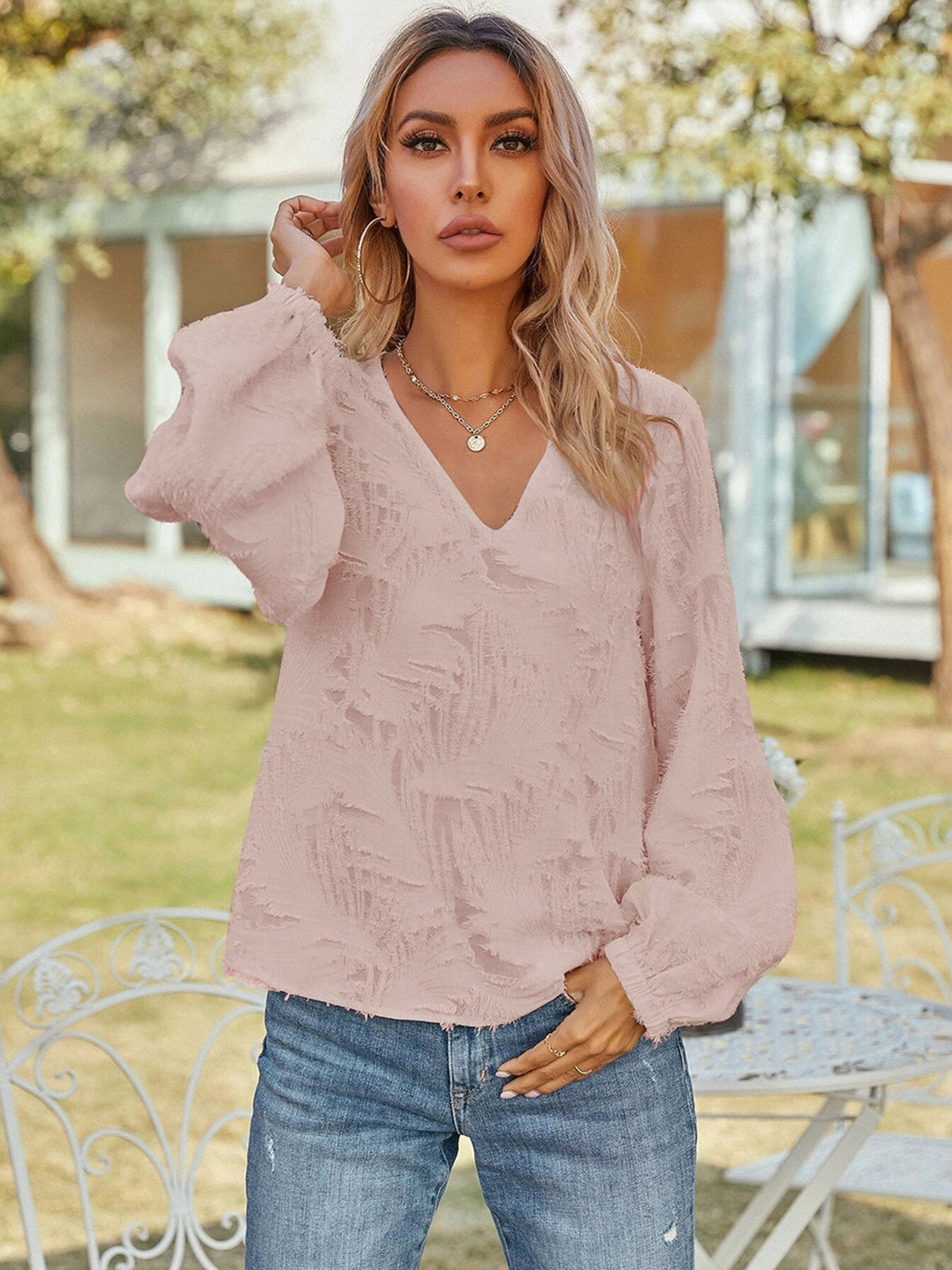 Textured v-neck blouse with balloon sleeves