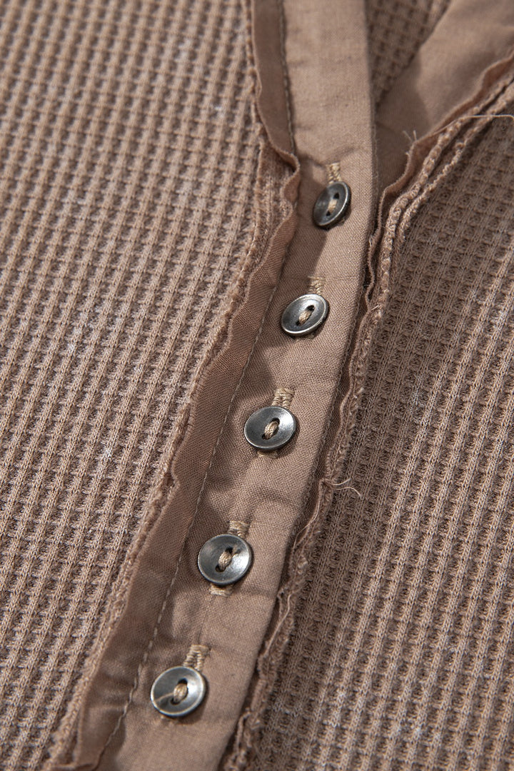 Waffle knit henley top with long sleeves and button placket