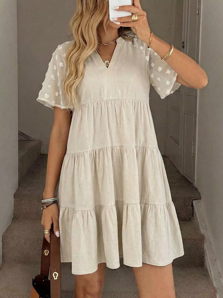 Apricot Swiss dot short-sleeve tiered cotton mini dress