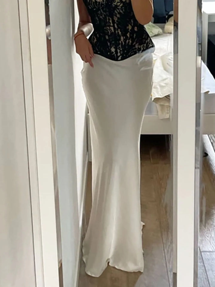 Fitted high-waist satin maxi skirt with flared hem