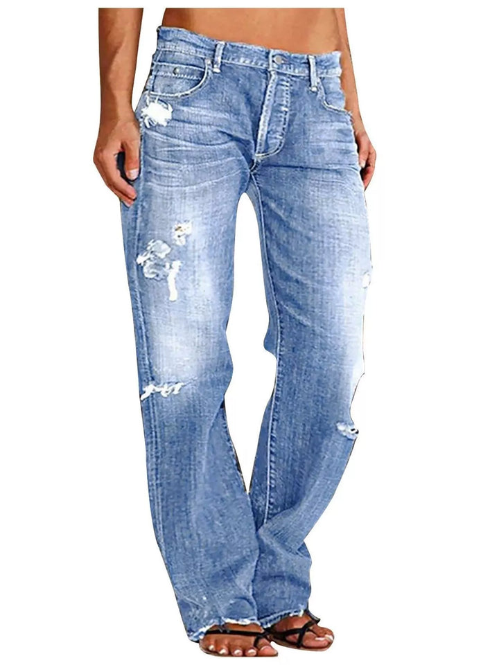 Light Blue Distressed loose fit straight leg jeans with raw hem