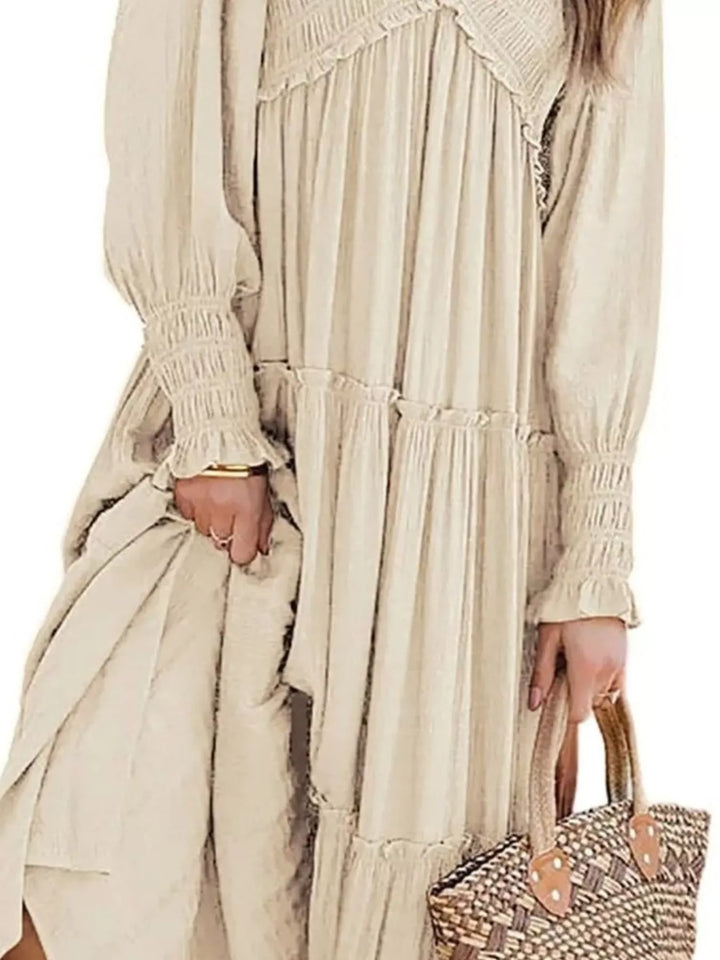 Smocked v-neck tiered maxi dress with long sleeves