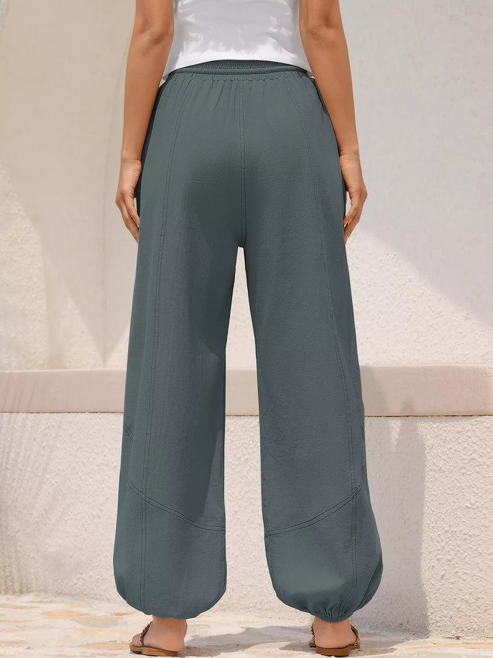 Drawstring waist wide-leg harem joggers with side pockets