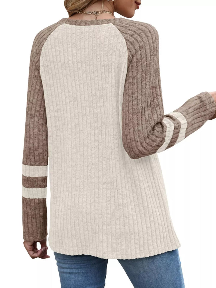 Ribbed knit raglan long sleeve top with varsity stripe sleeves