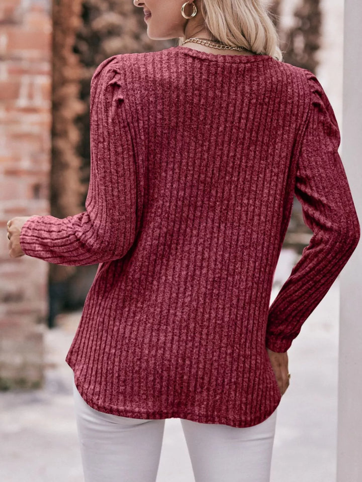 Ribbed knit long sleeve top with puff shoulders