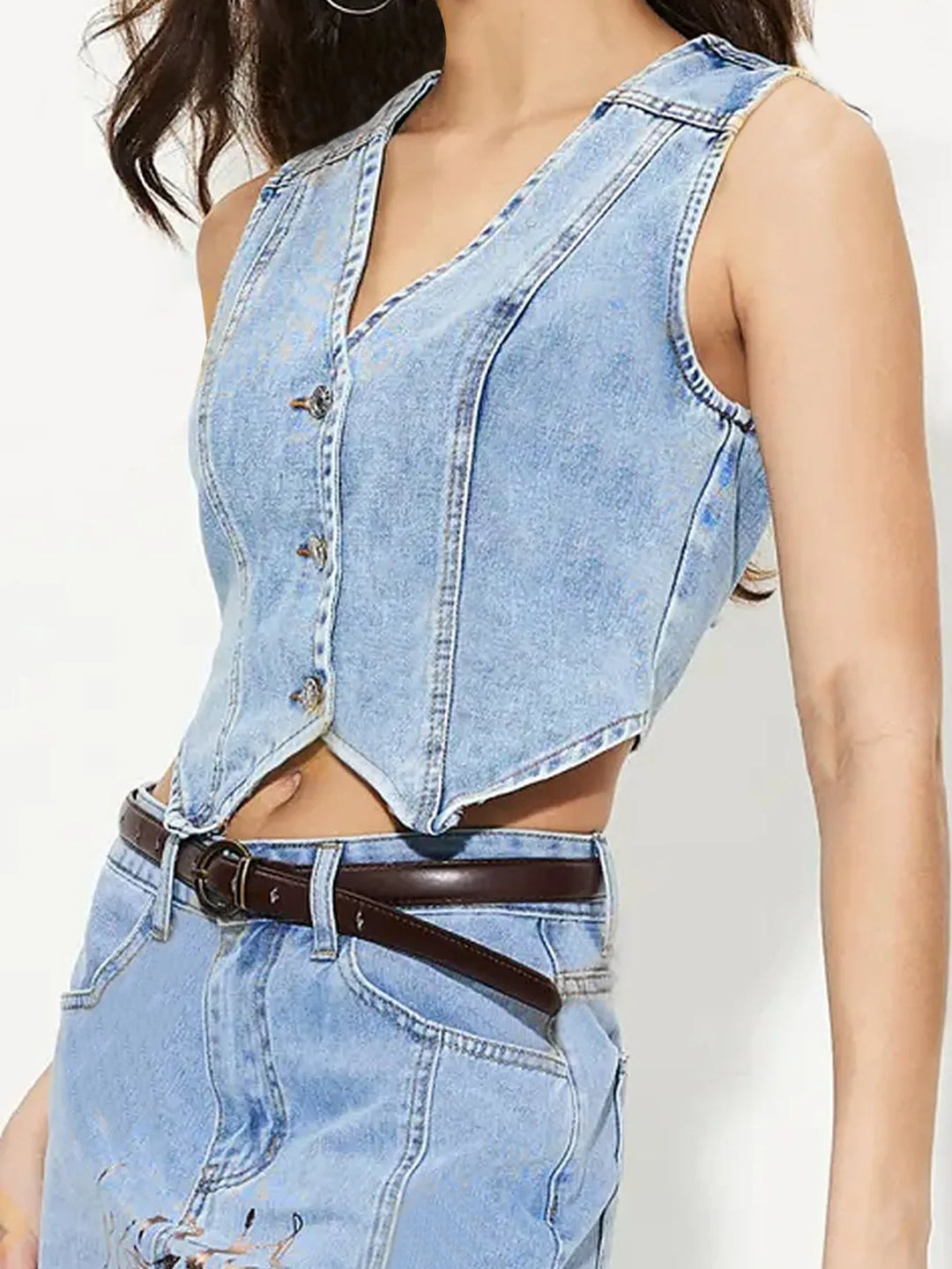 Fitted V-neck button-up denim vest with pointed hem