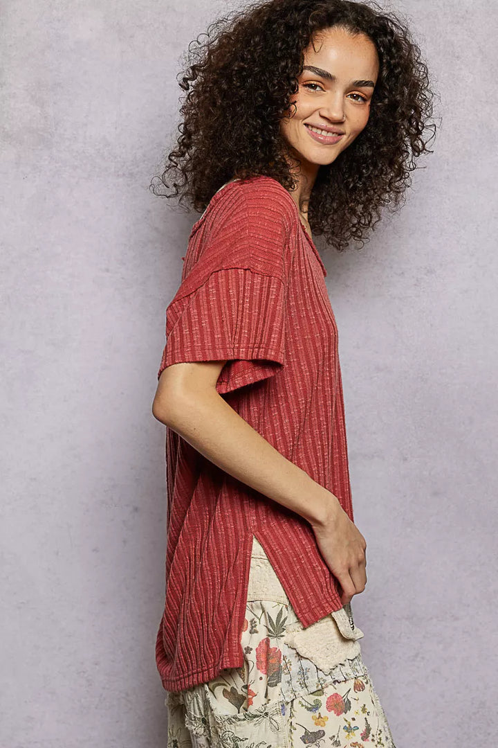 Ribbed knit V-neck tee with exposed seam and side slits