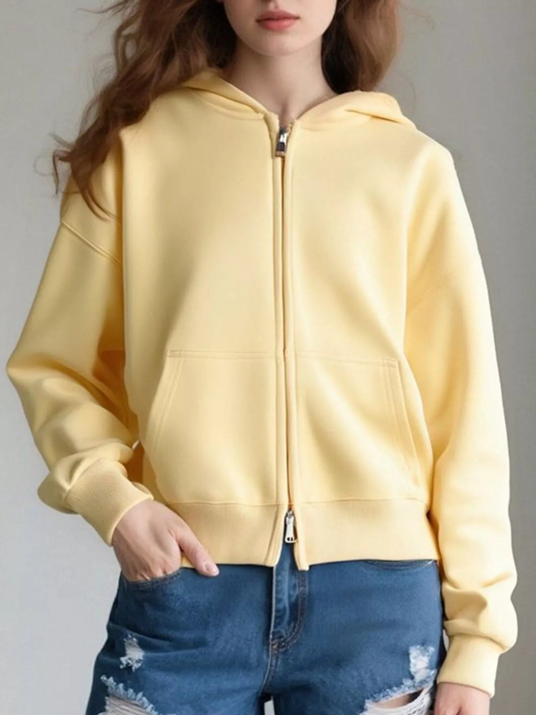 Yellow Zip-up hoodie with front pockets and ribbed cuffs
