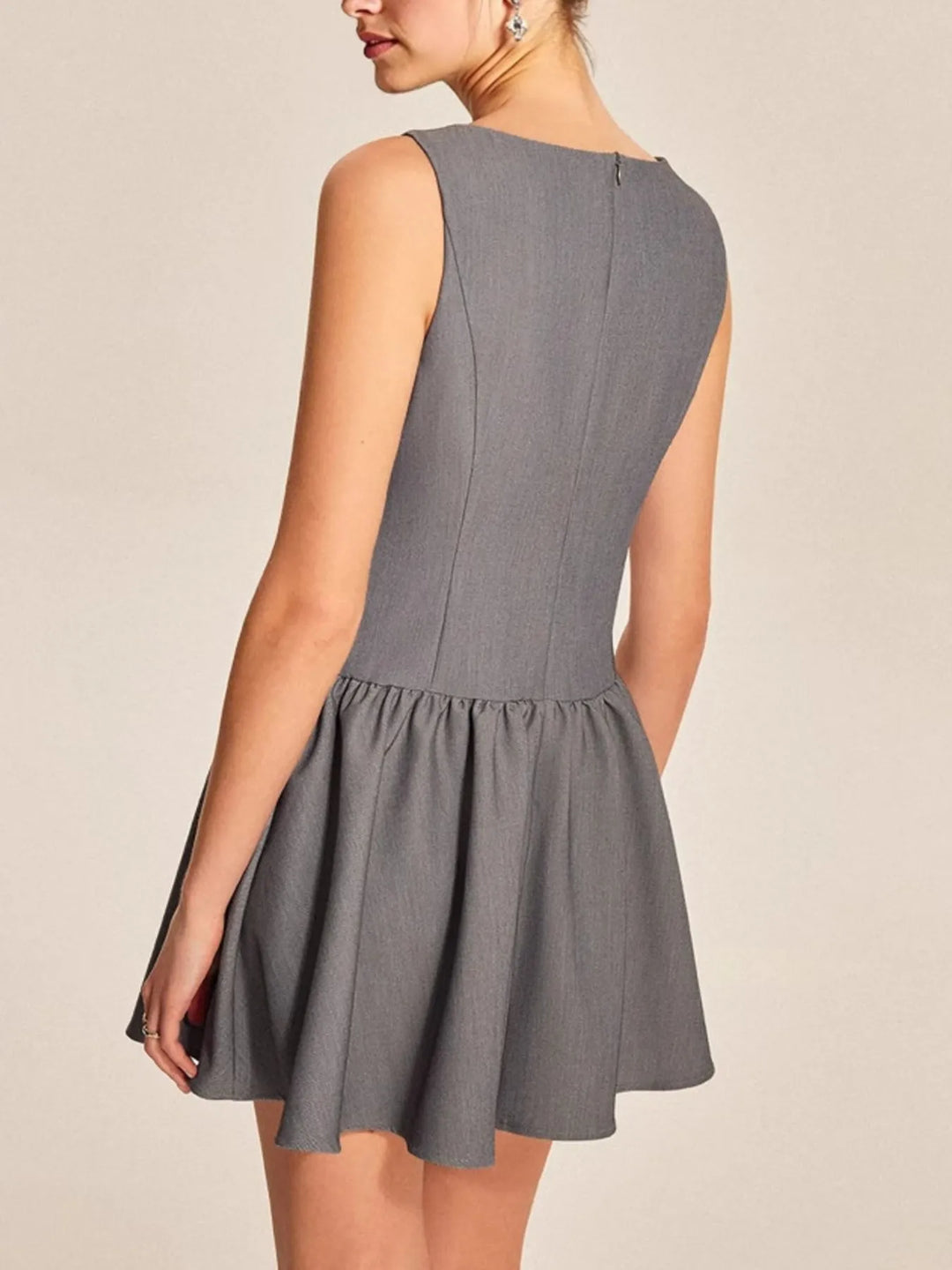 Boat neck sleeveless button-front drop-waist mini dress