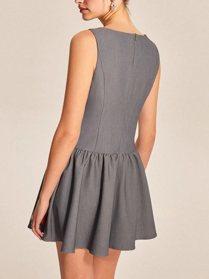 Boat neck sleeveless button-front drop-waist mini dress