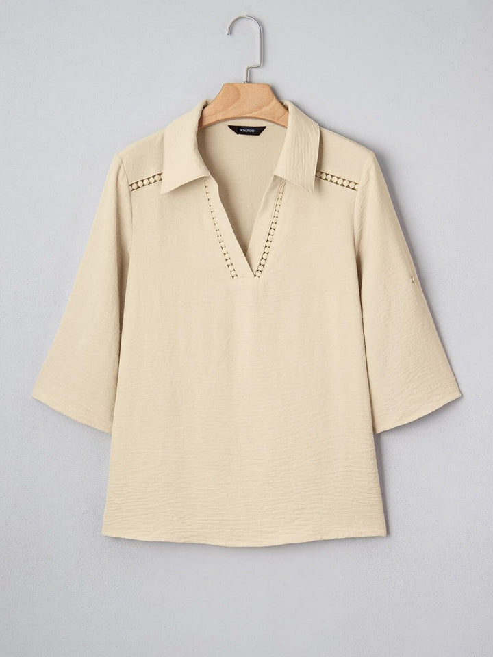Johnny collar blouse with crochet lace trim and roll-tab sleeves