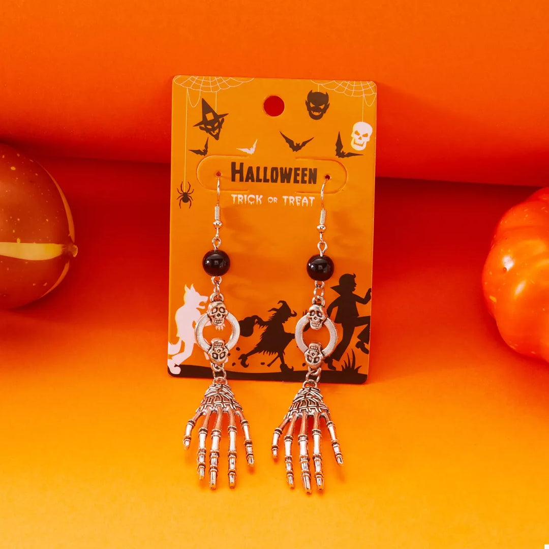 Skeleton hand drop earrings with skull charms
