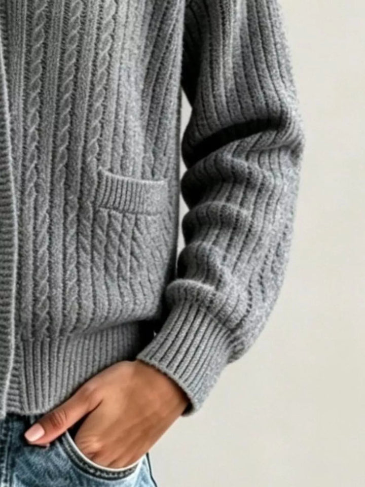 Shawl collar cable knit cardigan with patch pockets
