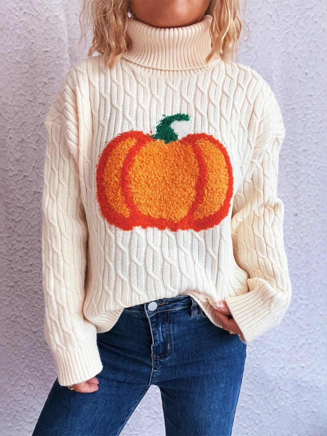 Pumpkin applique cable knit turtleneck sweater