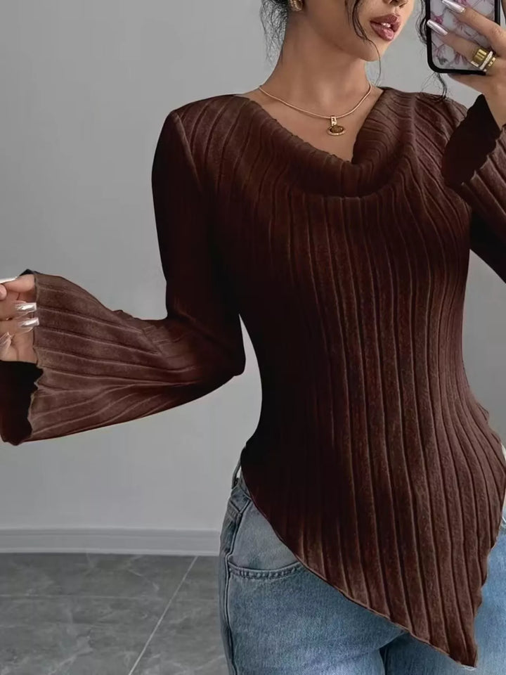 Ribbed knit top with asymmetric hem and flared sleeves