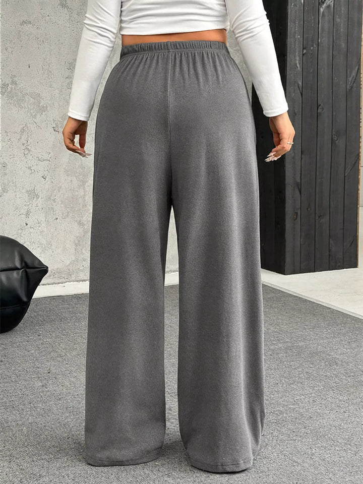 Wide-leg drawstring pants with elastic waist and pockets