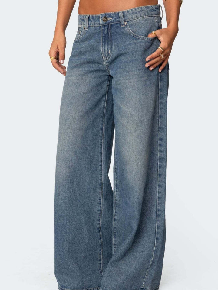 Vintage wash wide-leg jeans with whiskered fading