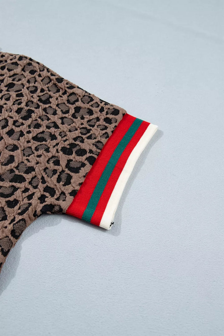 Leopard half-zip short sleeve top with striped collar and cuffs