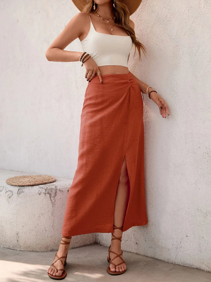 Front-slit midi skirt with twist waist detail