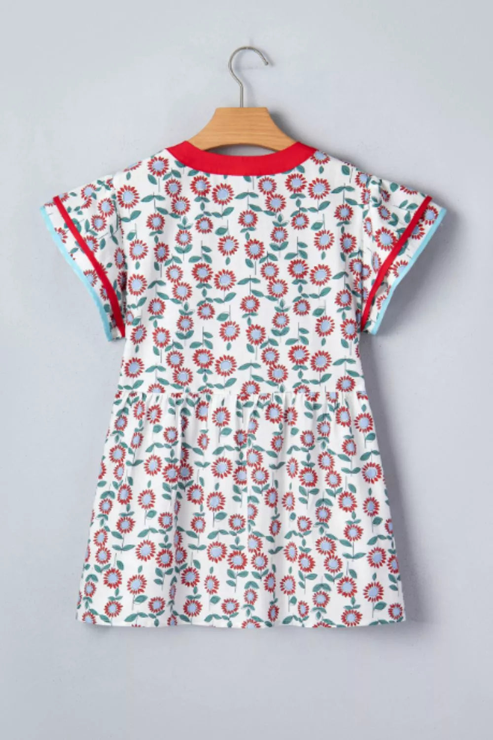 Floral babydoll blouse with ruffle cap sleeves and striped V-neck