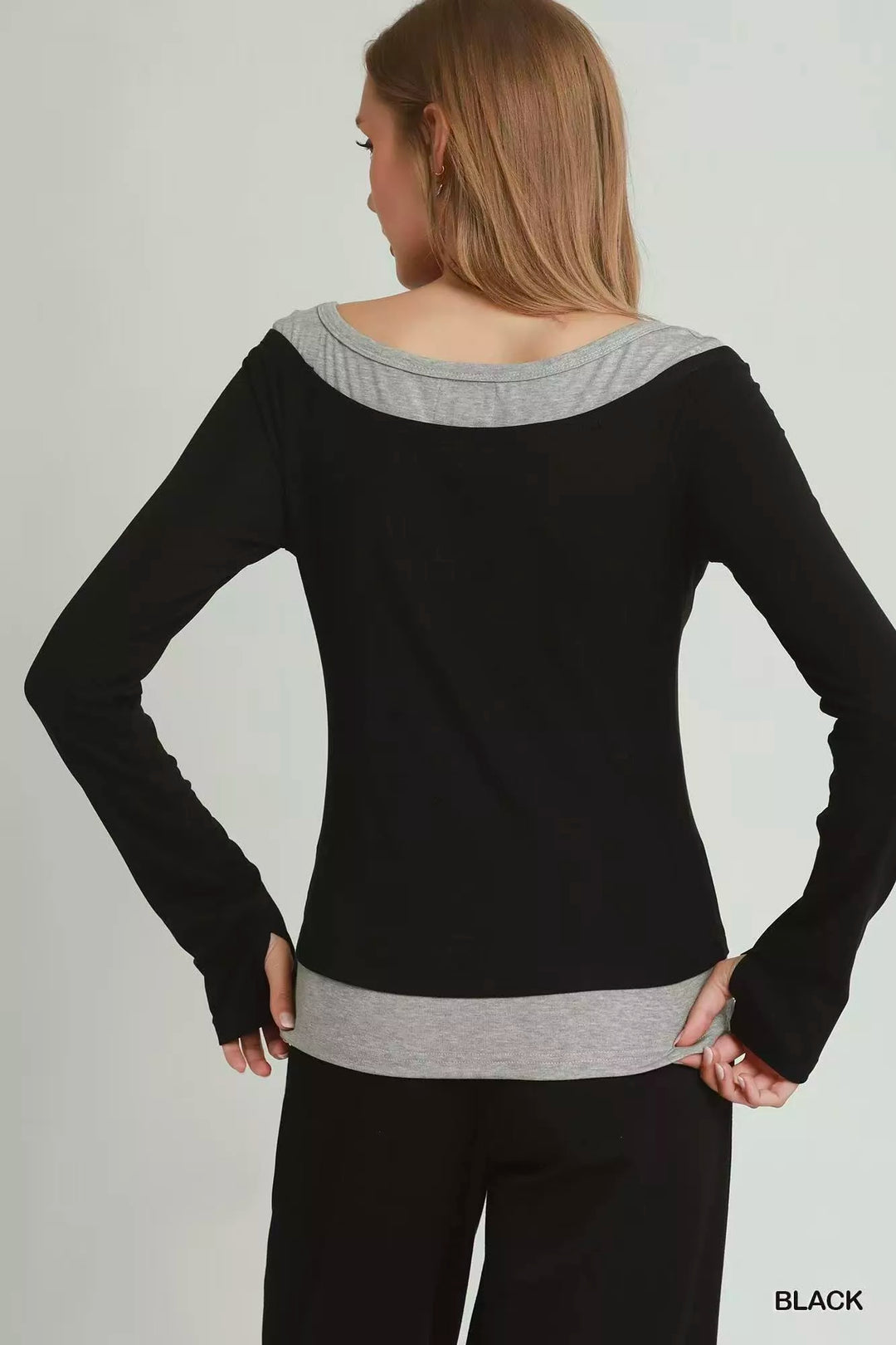 Twofer layered long sleeve top with contrast trim and thumbholes
