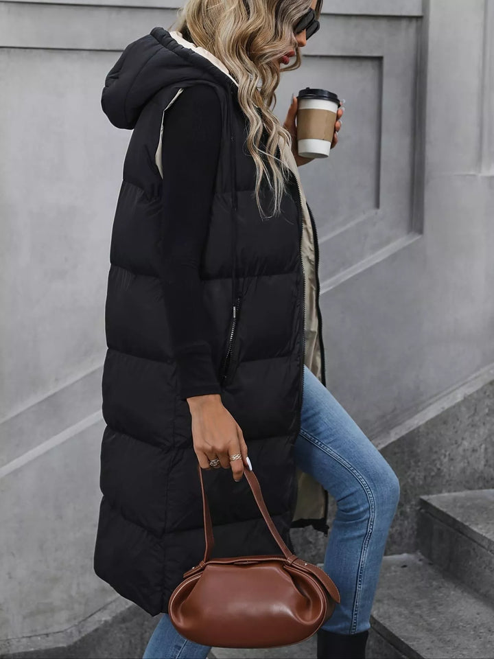 Longline hooded puffer vest with zip pockets