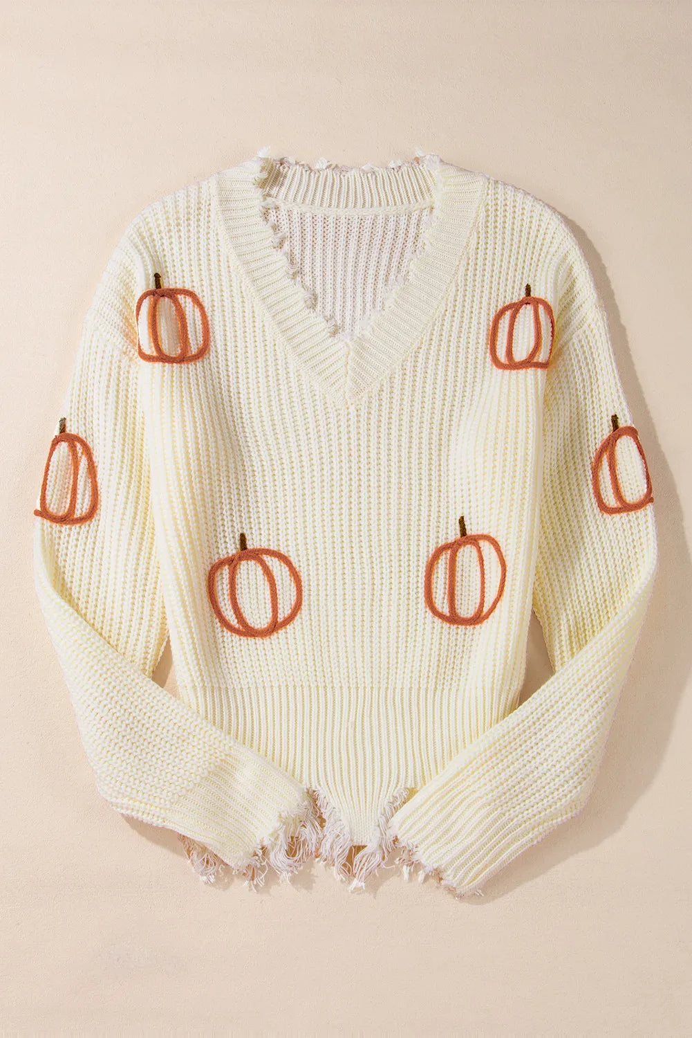 Pumpkin embroidered chunky knit sweater with frayed raw hem