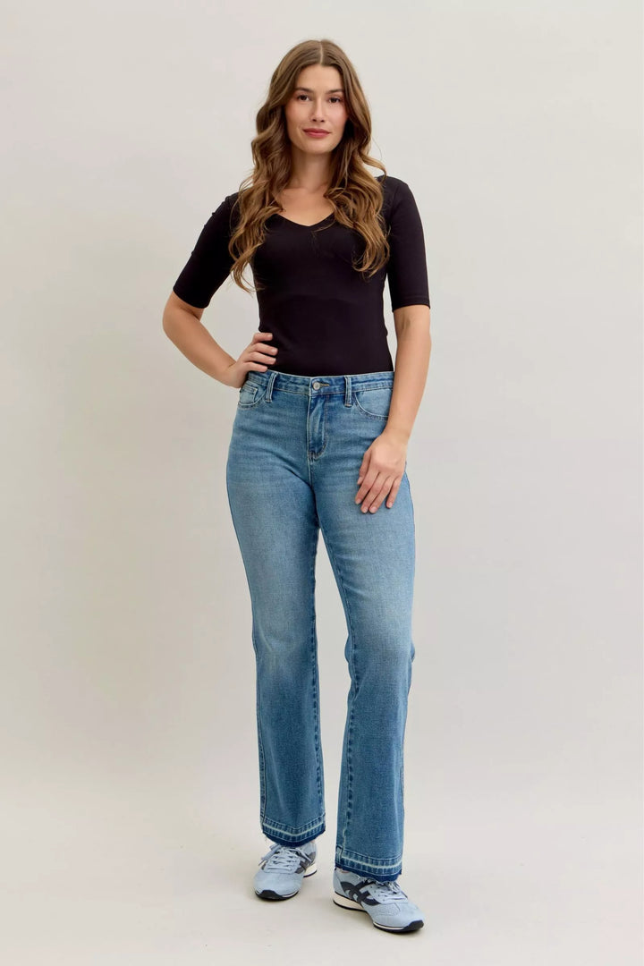 MD Mid-rise slim bootcut jeans with release hem and tummy control